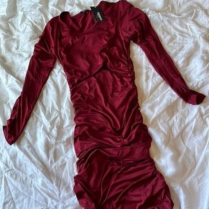 Red long sleeve ruched midi dress